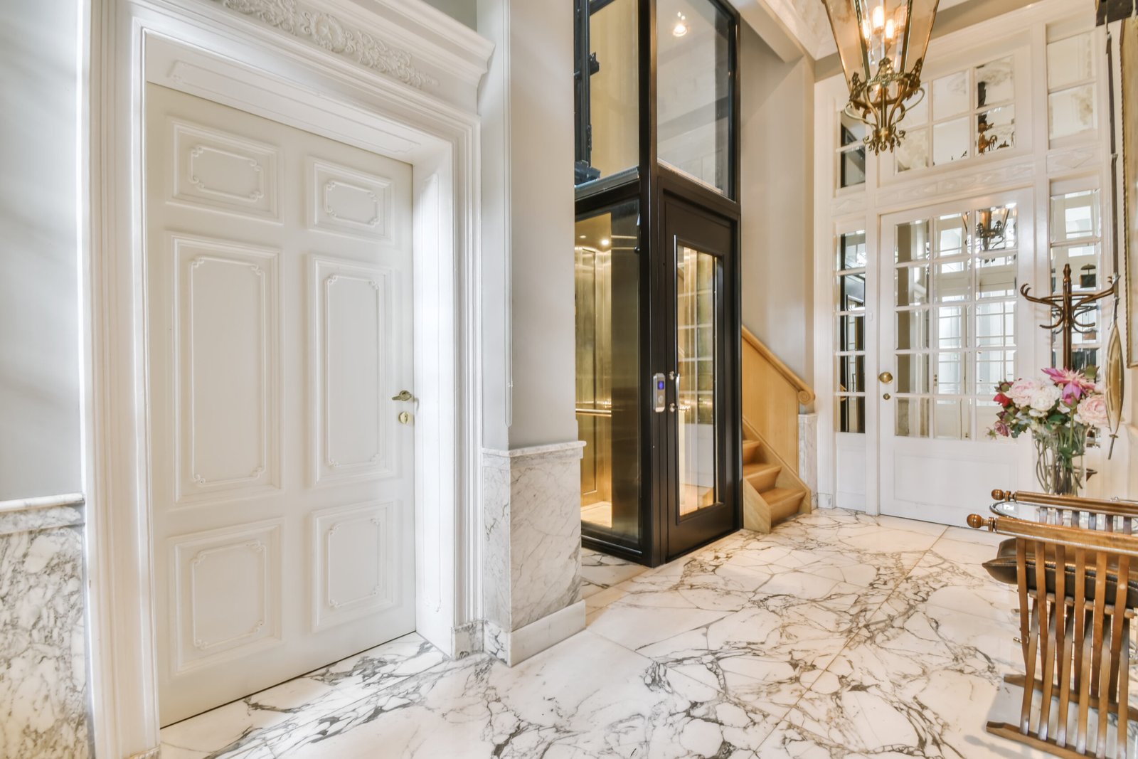 Architectural entrance hall with elevator access