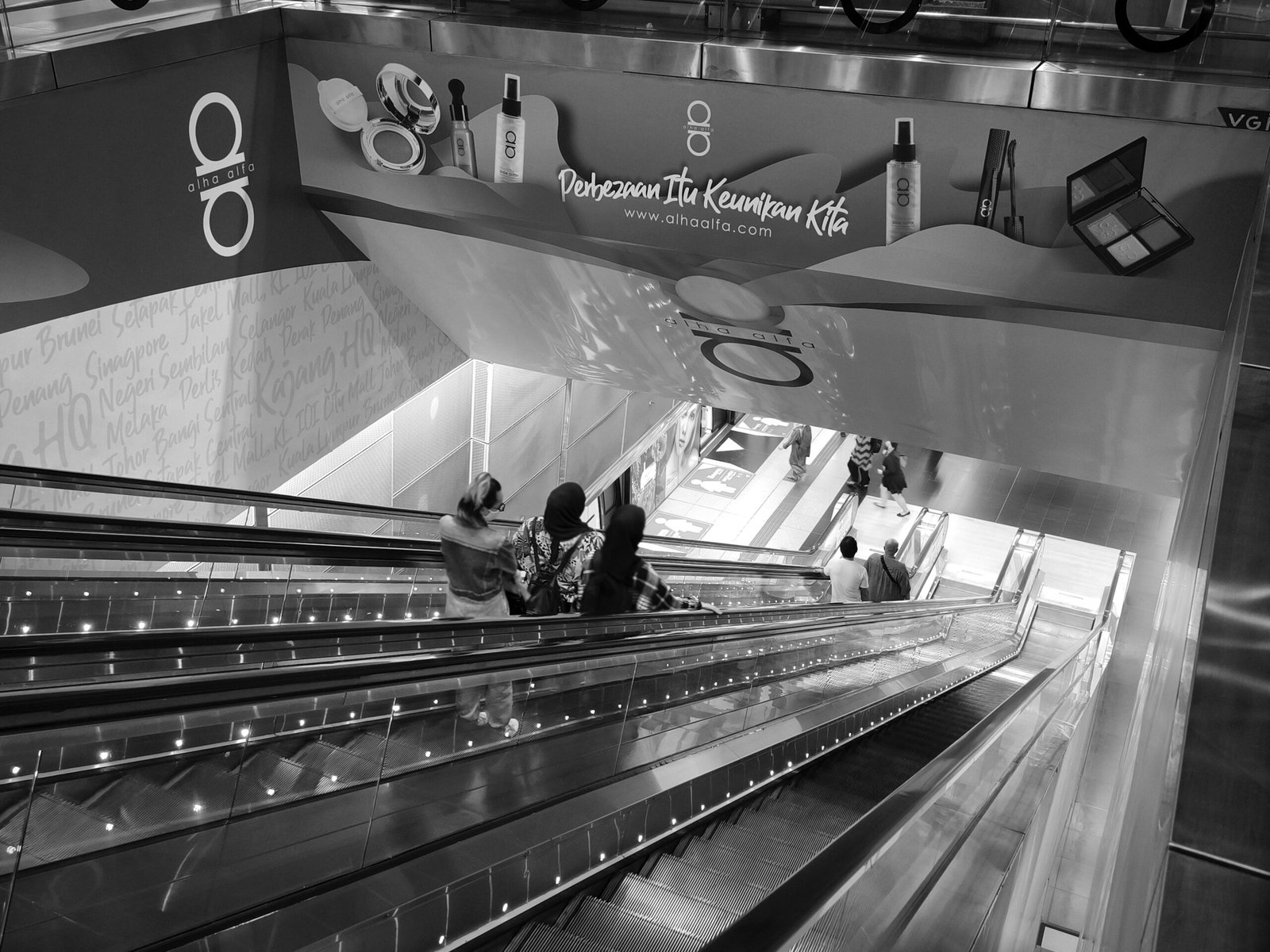Escalators and step treads in a covered station interior
