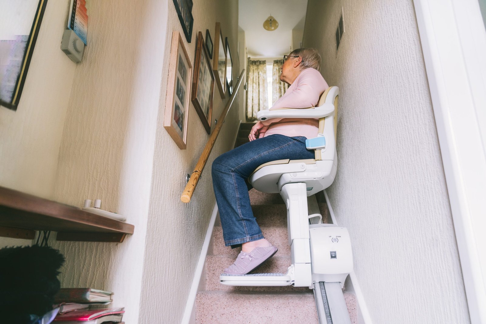 Home stairlift installed along a residential staircase