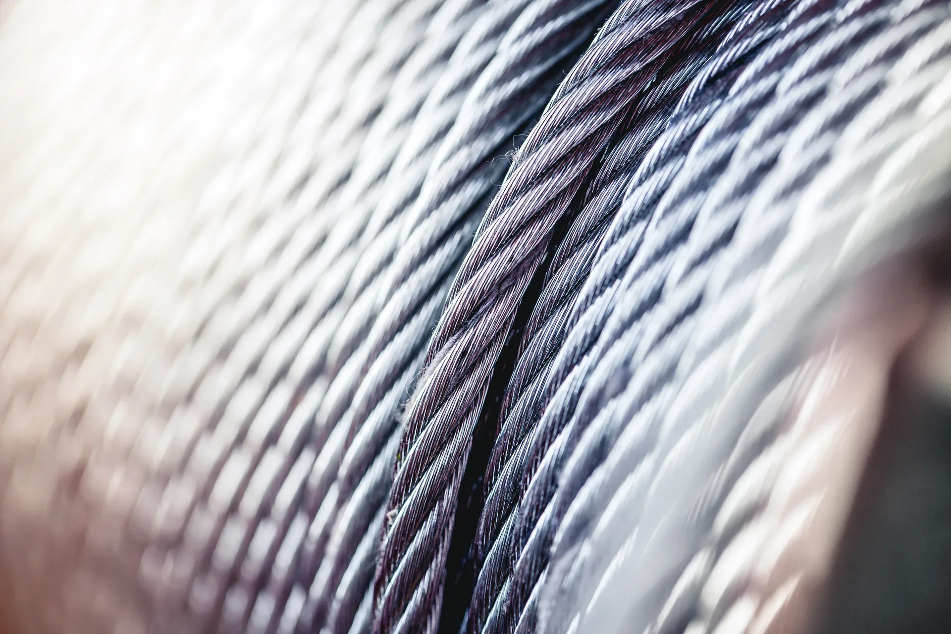 Close-up of steel wire ropes used in elevator suspension systems